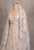 Ivory Heavy Embroidered Bridal Lehenga with V-Neck Blouse & Net Dupatta