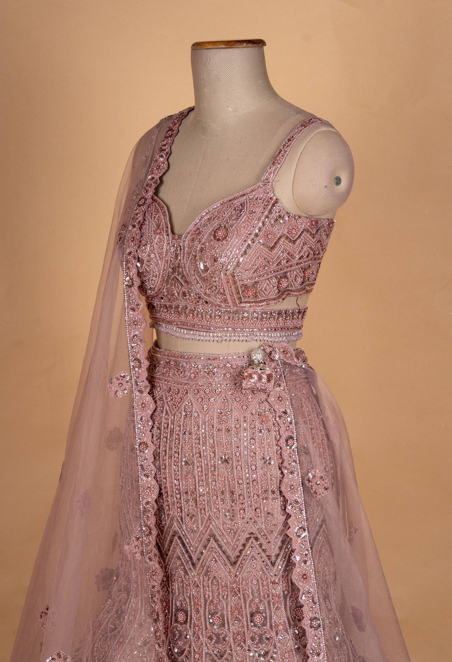 Dusty Rose Heavy Embroidered Bridal Lehenga with Net Dupatta