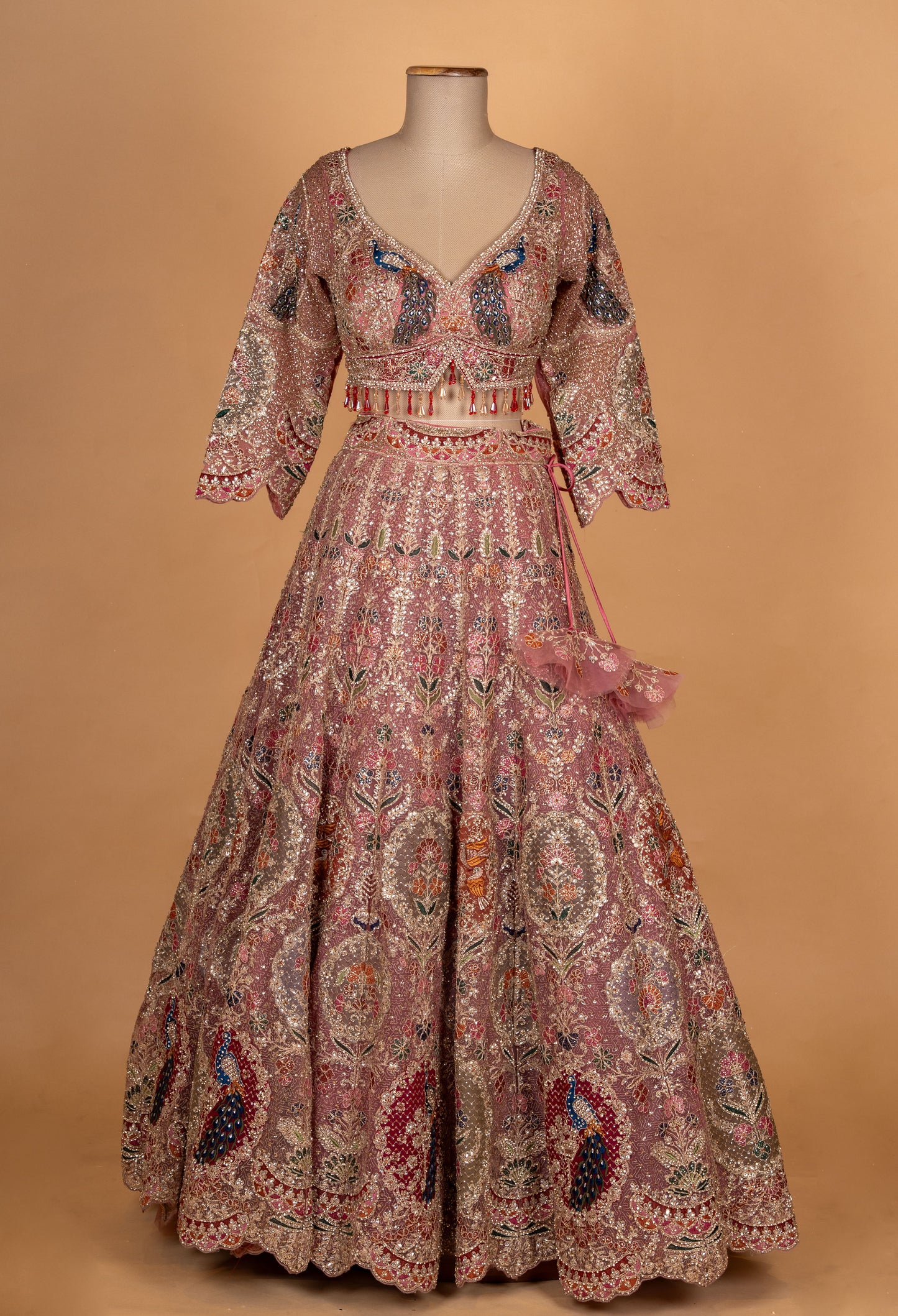 Blush Pink Multicolor Embroidered Bridal Lehenga with Net Dupatta