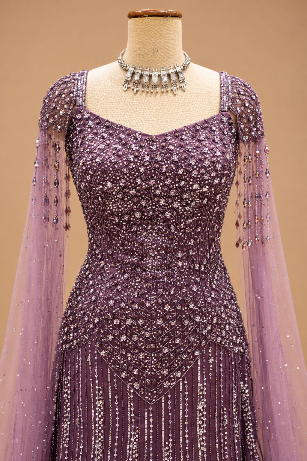 Elegant Dusty Mauve Designer Gown with Sequin Embroidery & Cape Sleeves