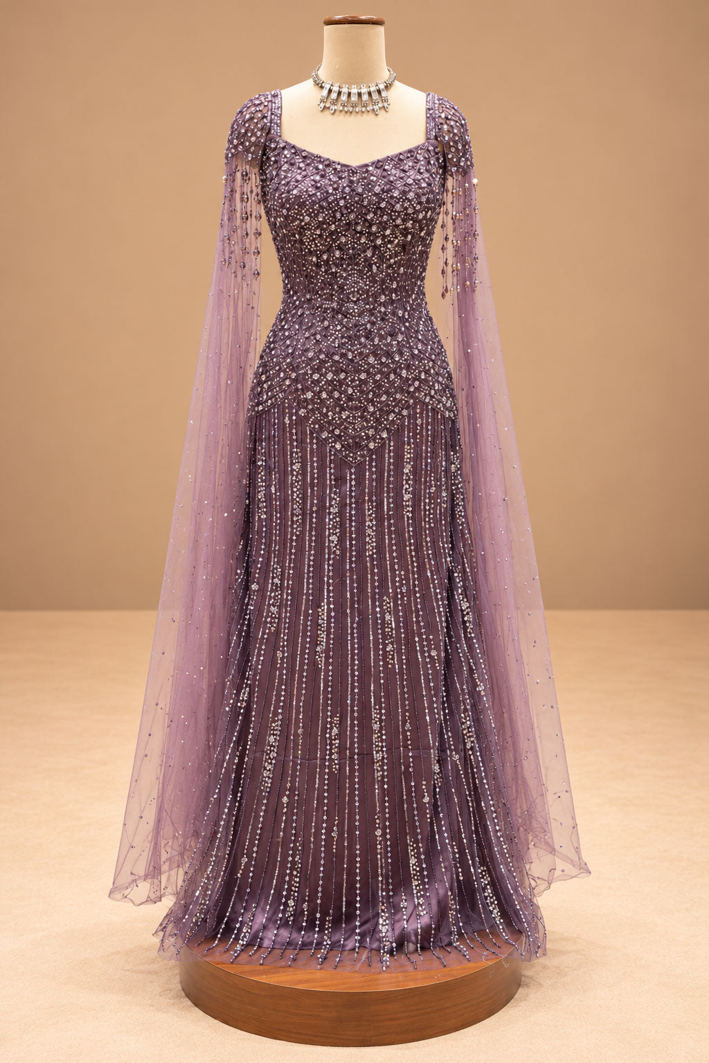 Elegant Dusty Mauve Designer Gown with Sequin Embroidery & Cape Sleeves