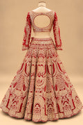 Luxury Red Bridal Lehenga with Heavy Gold Embroidery and Royal Architectural Motifs