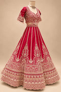 Luxury Maroon Bridal Lehenga with Intricate Gold Embroidery and Scalloped Border