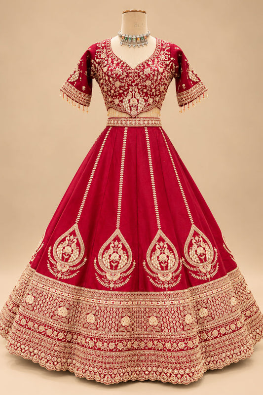 Luxury Maroon Bridal Lehenga with Gold Floral Embroidery and Heavy Embellished Border