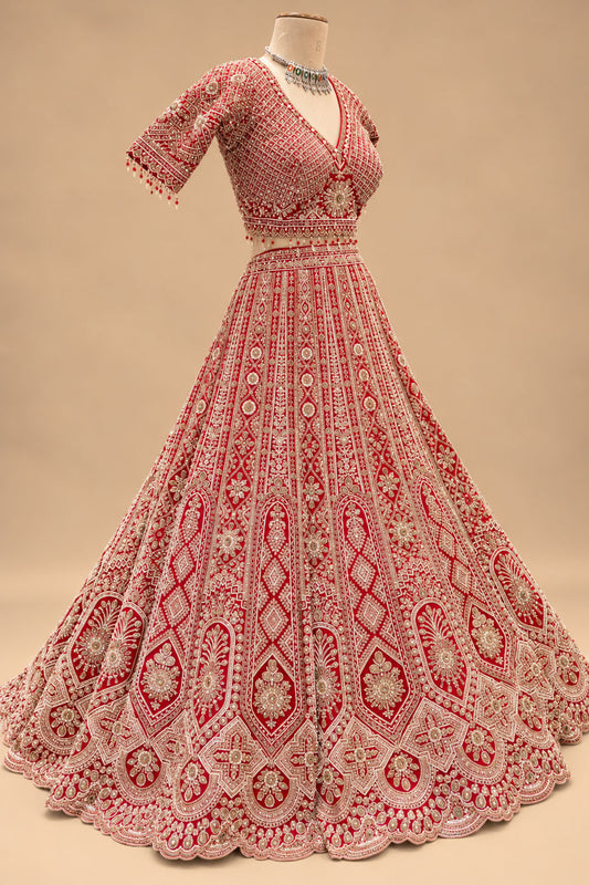 Luxury Red Bridal Lehenga with Intricate Gold Embroidery and Heavy Embellished Dupatta