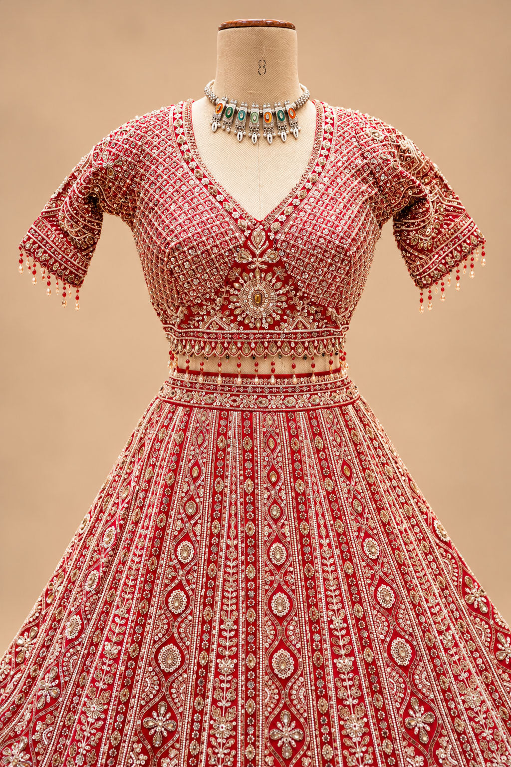 Luxury Red Bridal Lehenga with Intricate Gold Embroidery and Heavy Embellished Dupatta