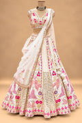Luxury Ivory Bridal Lehenga with Multicolor Floral Embroidery and Mirror-Style Embellishments