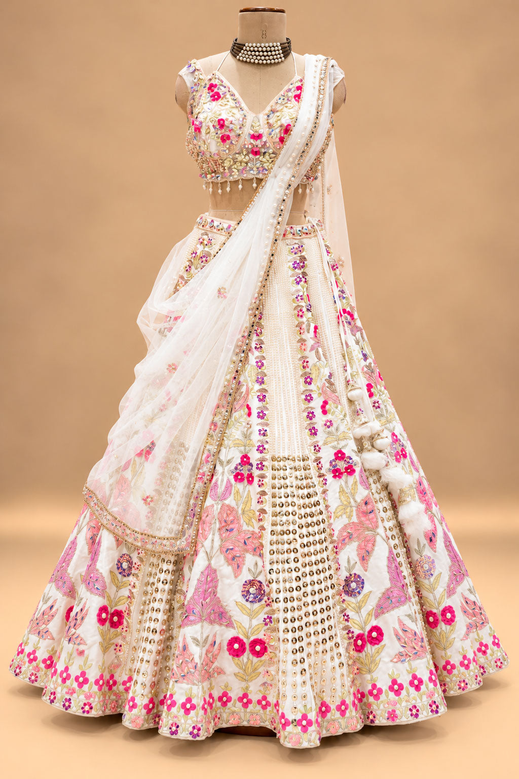 Luxury Ivory Bridal Lehenga with Multicolor Floral Embroidery and Mirror-Style Embellishments
