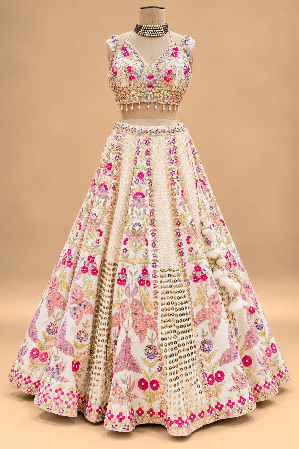Luxury Ivory Bridal Lehenga with Multicolor Floral Embroidery and Mirror-Style Embellishments
