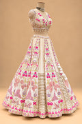 Luxury Ivory Bridal Lehenga with Multicolor Floral Embroidery and Mirror-Style Embellishments