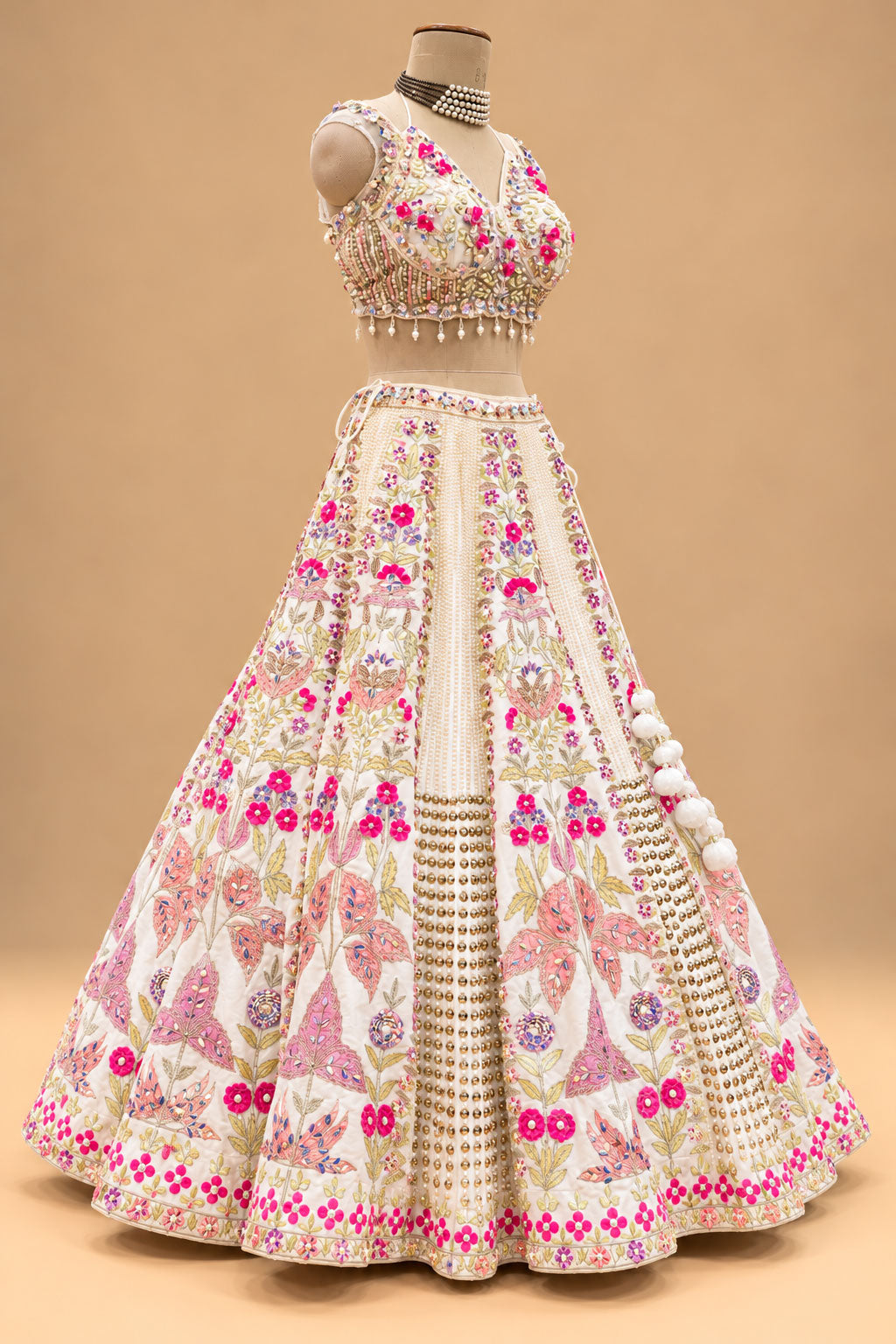 Luxury Ivory Bridal Lehenga with Multicolor Floral Embroidery and Mirror-Style Embellishments