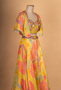 Yellow Floral Printed Lehenga Choli with Cape Dupatta – Designer Haldi & Mehendi Outfit for Women
