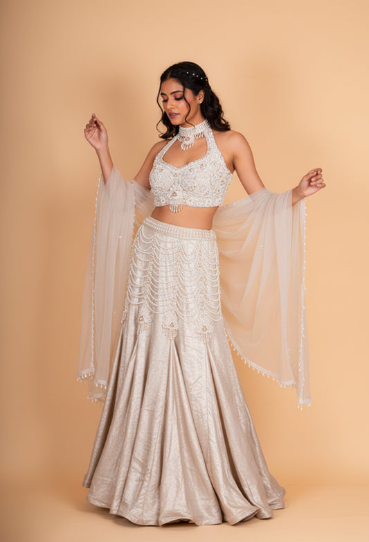 Luxury Champagne Gold Embellished Lehenga Choli with Halter Neck Blouse & Sheer Dupatta