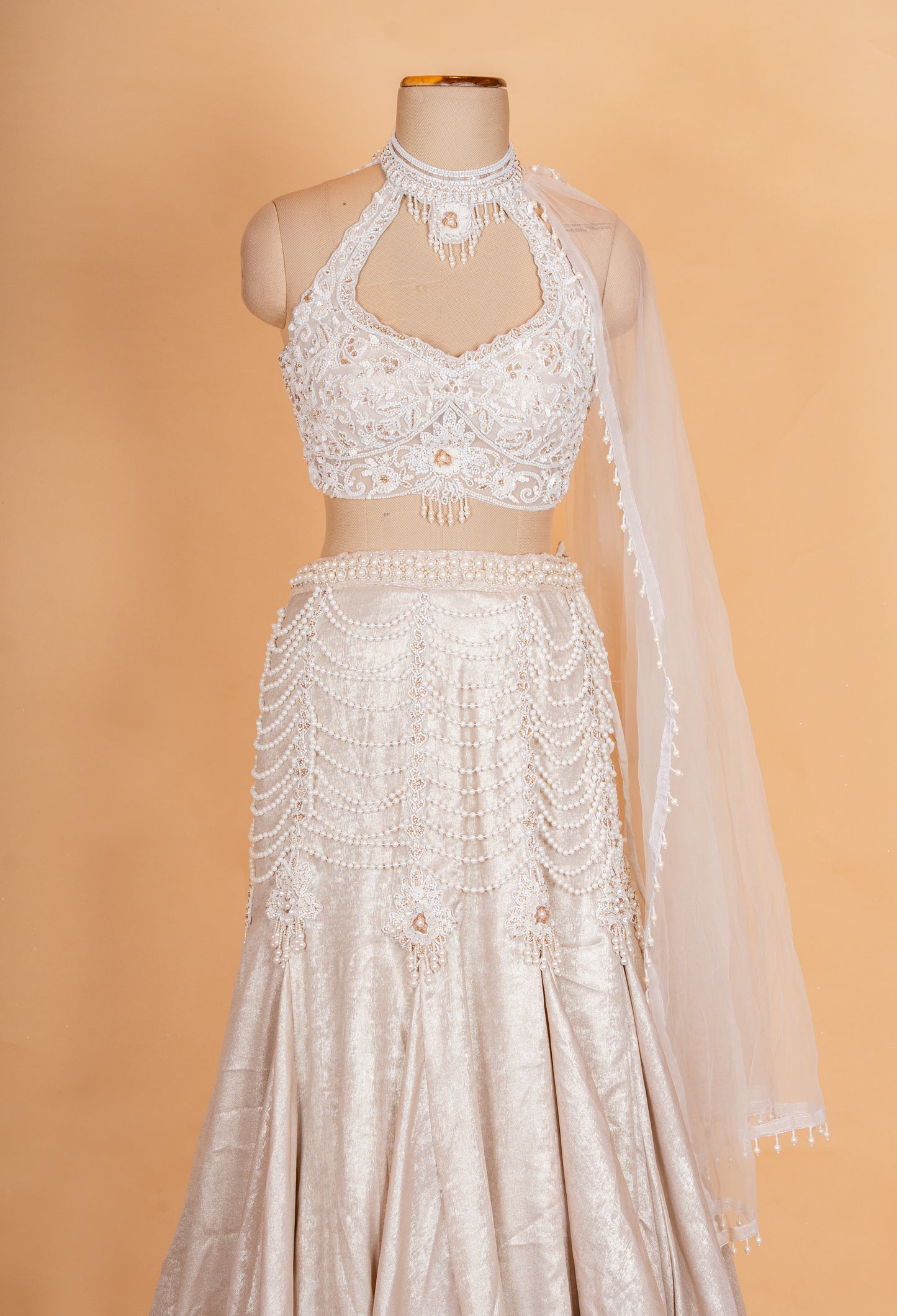 Luxury Champagne Gold Embellished Lehenga Choli with Halter Neck Blouse & Sheer Dupatta