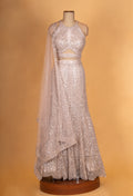 Champagne Beige Sequined Lehenga Set with Halter Neck Blouse & Net Dupatta | Designer Reception Wear