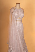 Champagne Beige Sequined Lehenga Set with Halter Neck Blouse & Net Dupatta | Designer Reception Wear