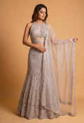 Champagne Beige Sequined Lehenga Set with Halter Neck Blouse & Net Dupatta | Designer Reception Wear