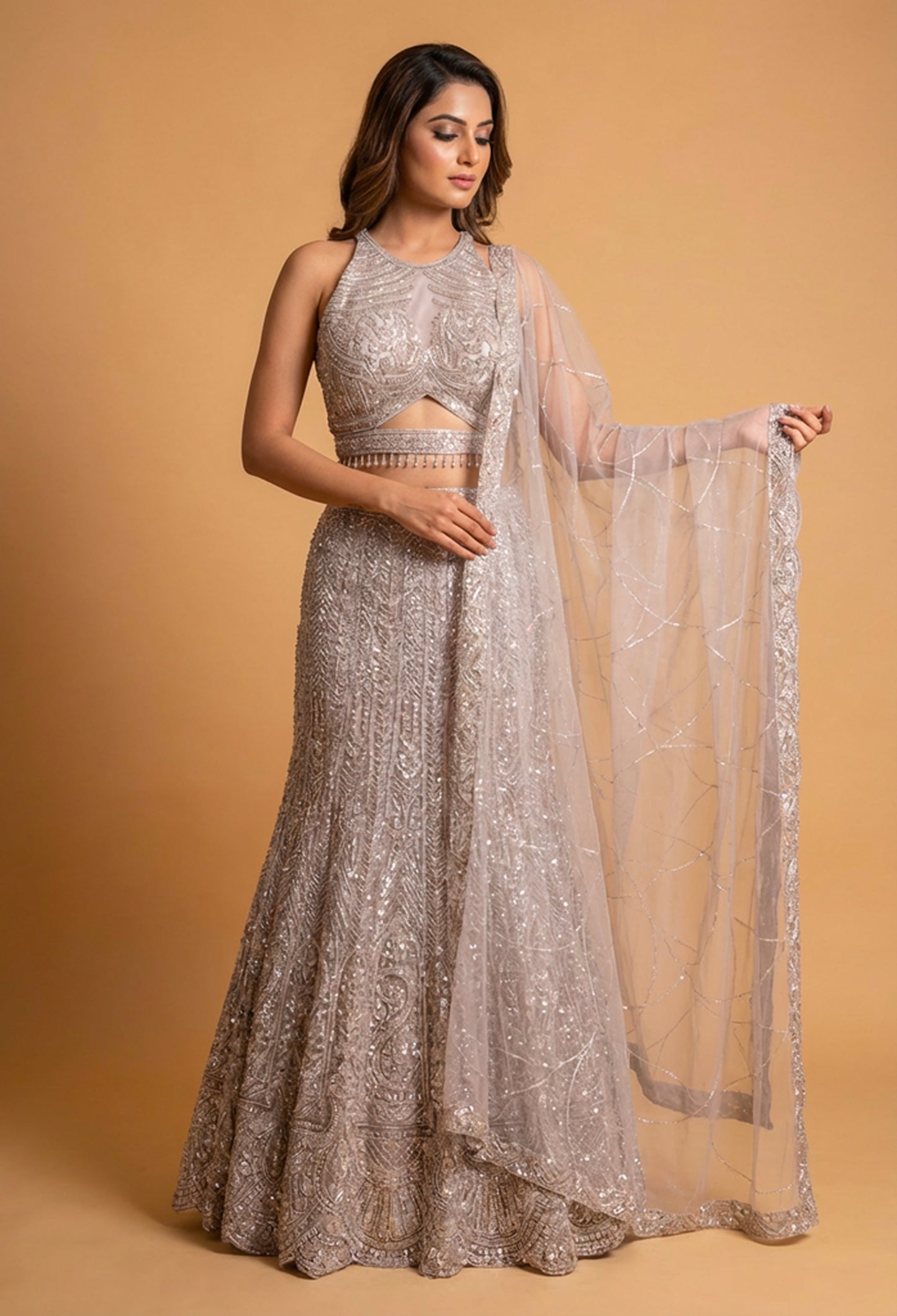 Champagne Beige Sequined Lehenga Set with Halter Neck Blouse & Net Dupatta | Designer Reception Wear