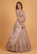 Blush Peach Floral Embroidered Bridal Lehenga Set with Net Dupatta