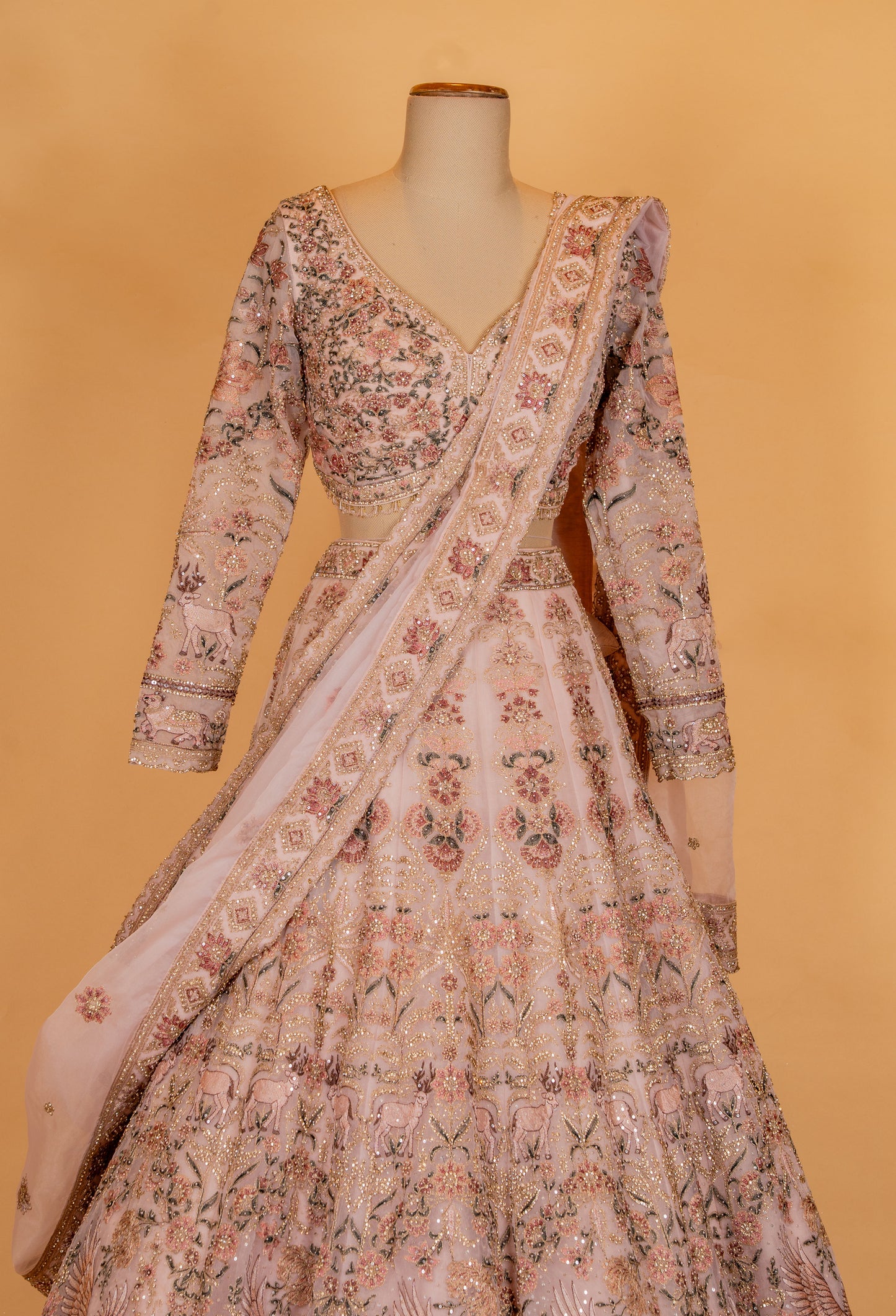 Blush Peach Floral Embroidered Bridal Lehenga Set with Net Dupatta