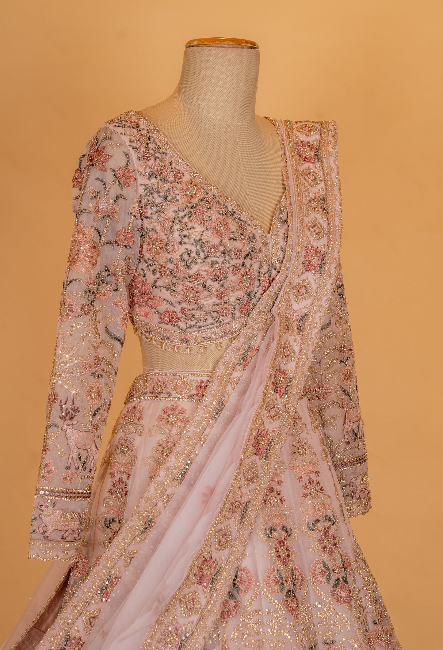 Blush Peach Floral Embroidered Bridal Lehenga Set with Net Dupatta