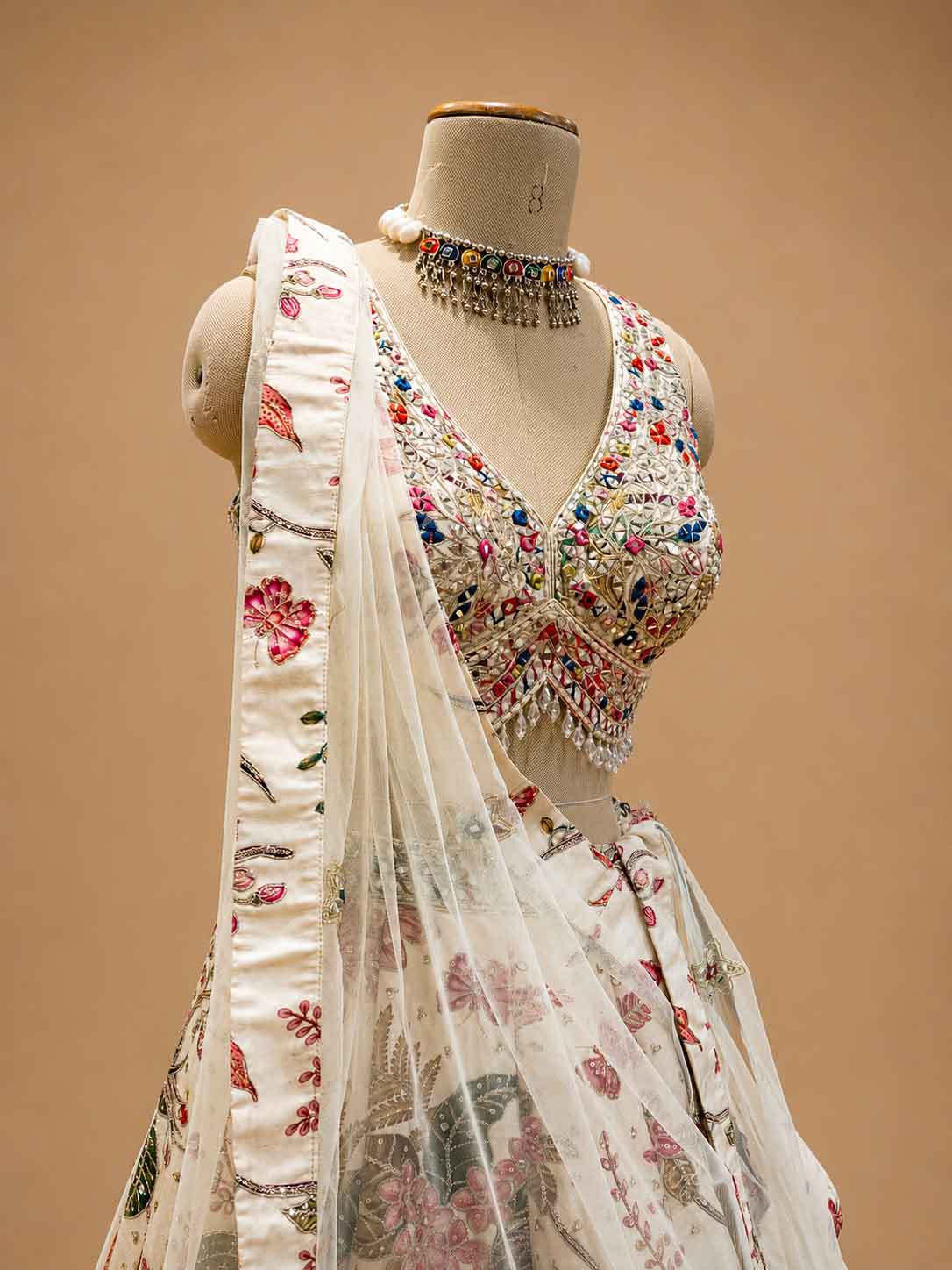 Ivory Floral Printed Designer Lehenga Set with Embroidered Sleeveless Blouse & Dupatta