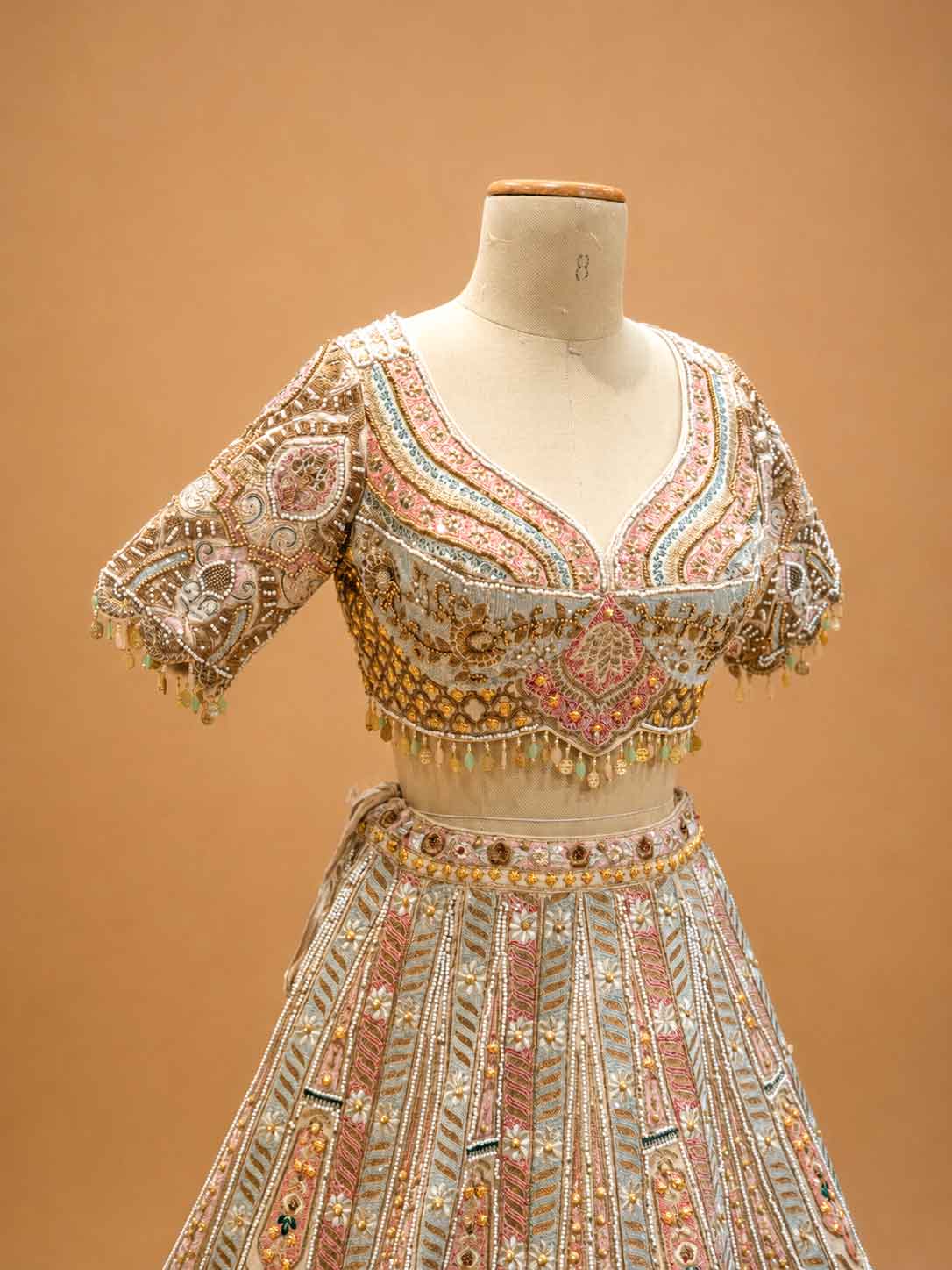 Pastel Multicolor Designer Bridal Lehenga with Intricate Embroidery & Embellished Net Dupatta