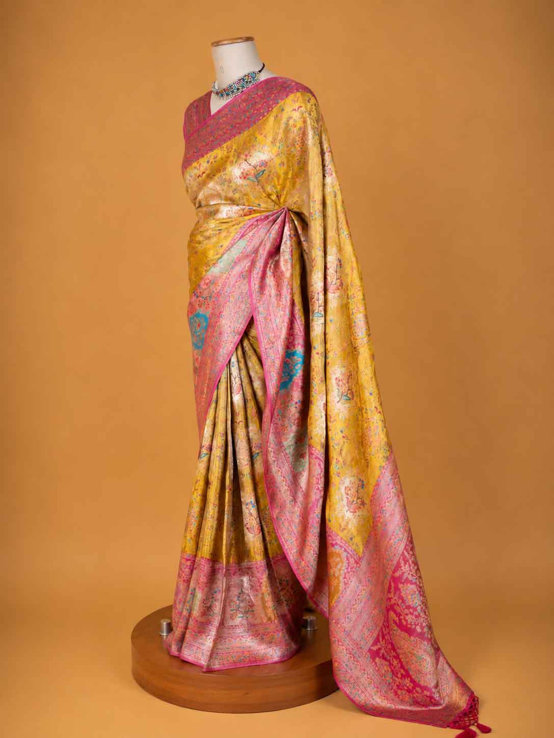 Women’s Yellow Saree with Pink Woven Border & Floral Motifs | Festive Wear