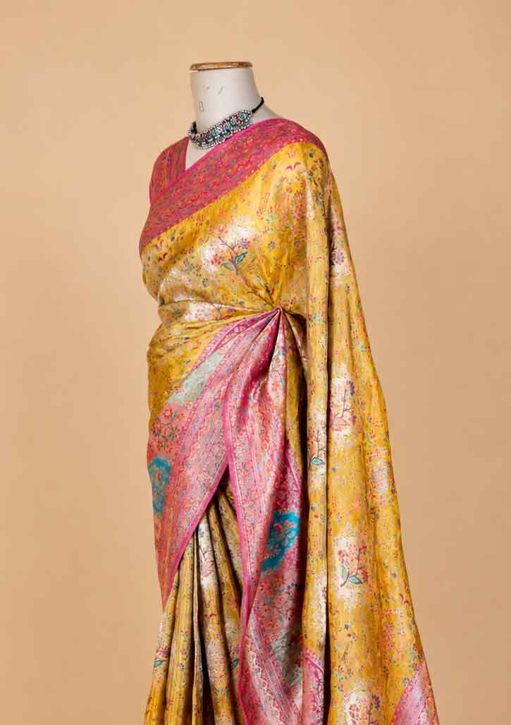 Women’s Yellow Saree with Pink Woven Border & Floral Motifs | Festive Wear