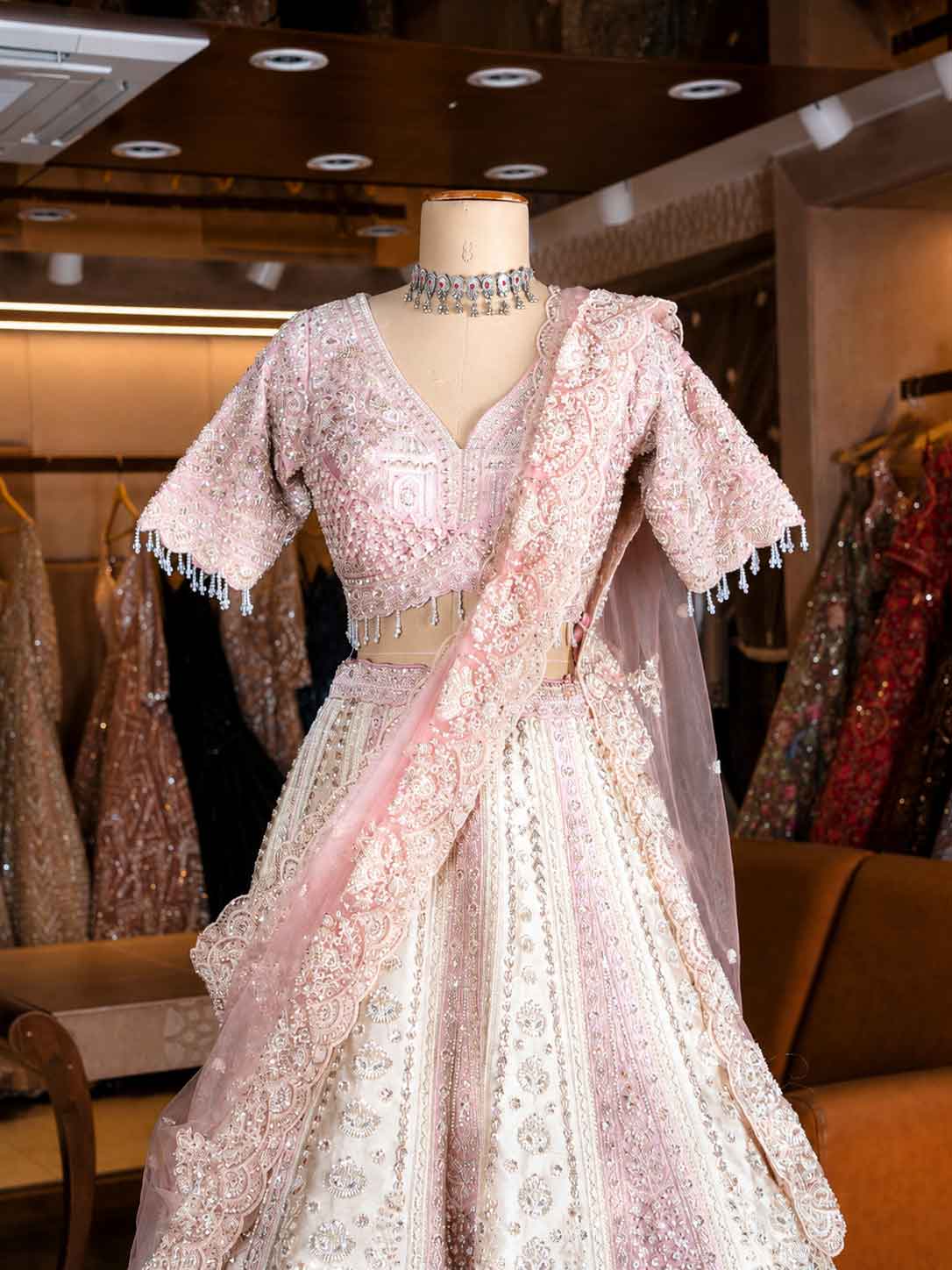 Elegant Cream Embroidered Lehenga Set with Statement Blouse | Wedding & Festive Wear