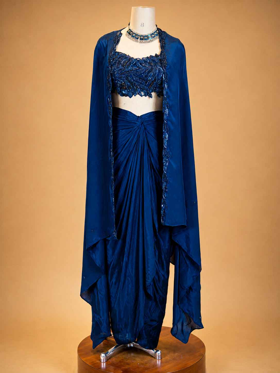 Navy Blue Designer Draped Skirt Set for Women | Embellished Crop Top & Cape