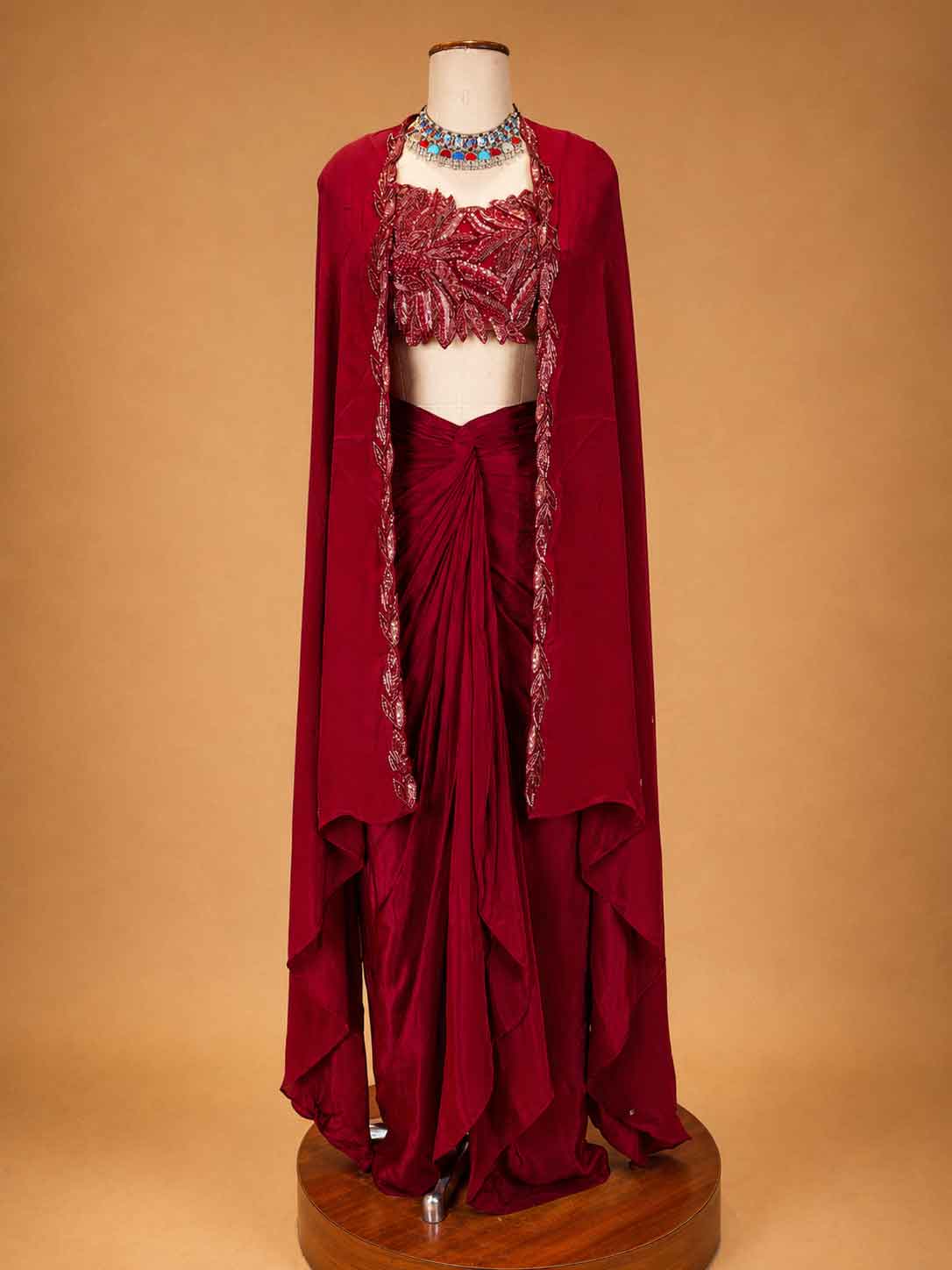 Maroon Designer Draped Skirt Set for Women | Embellished Crop Top & Cape