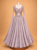 Peach colour embellished designer lehenga set for women with flared skirt and sheer sleeves