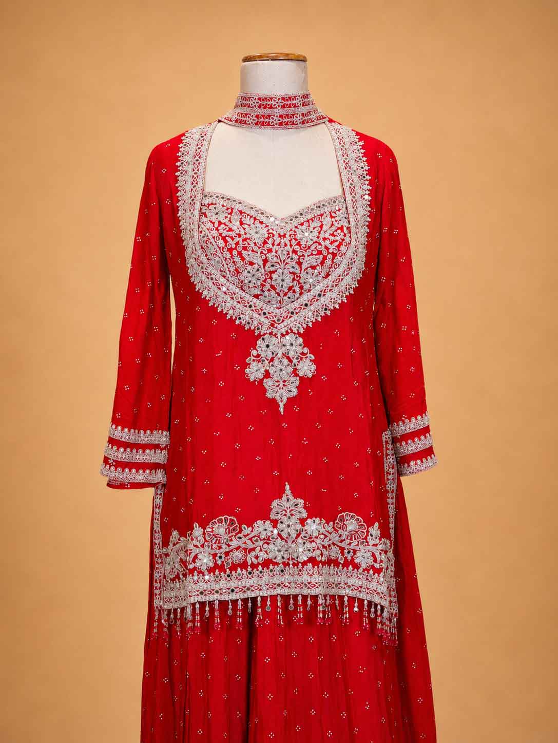 Red embroidered sharara set for women with white detailing and sheer dupatta