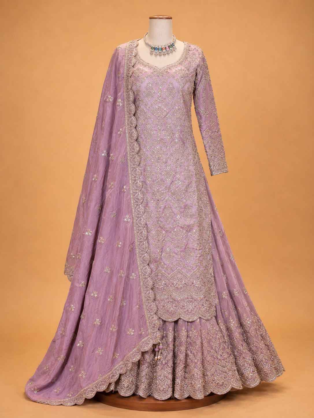 Onion colour embroidered Anarkali suit set for women with matching dupatta and flared silhouette