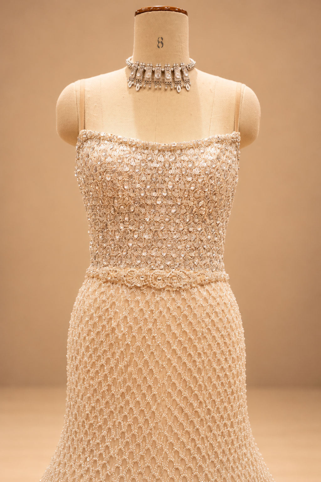 Premium Champagne Gold Pearl Embellished Mermaid Gown with Floral Bodice and Beaded Tassel Detailing – product image 3