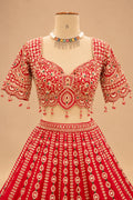 Luxury Bridal Red Lehenga with Intricate Gold Embroidery, Traditional Paisley Motifs and Designer Dupatta