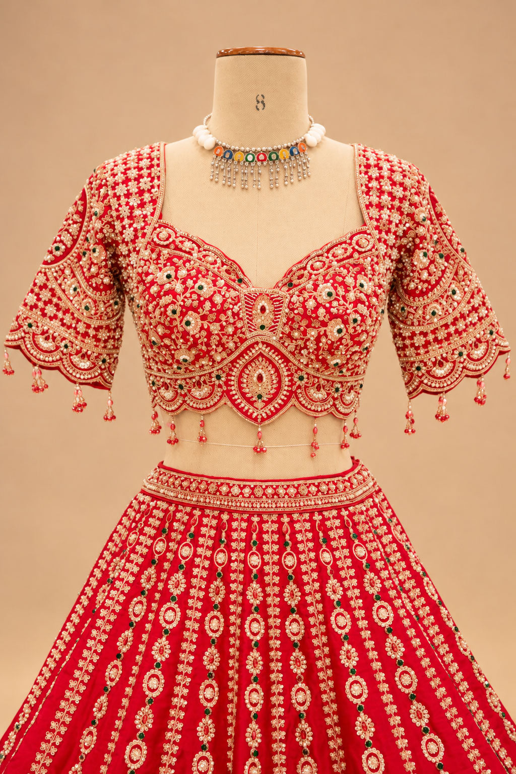 Luxury Bridal Red Lehenga with Intricate Gold Embroidery, Traditional Paisley Motifs and Designer Dupatta