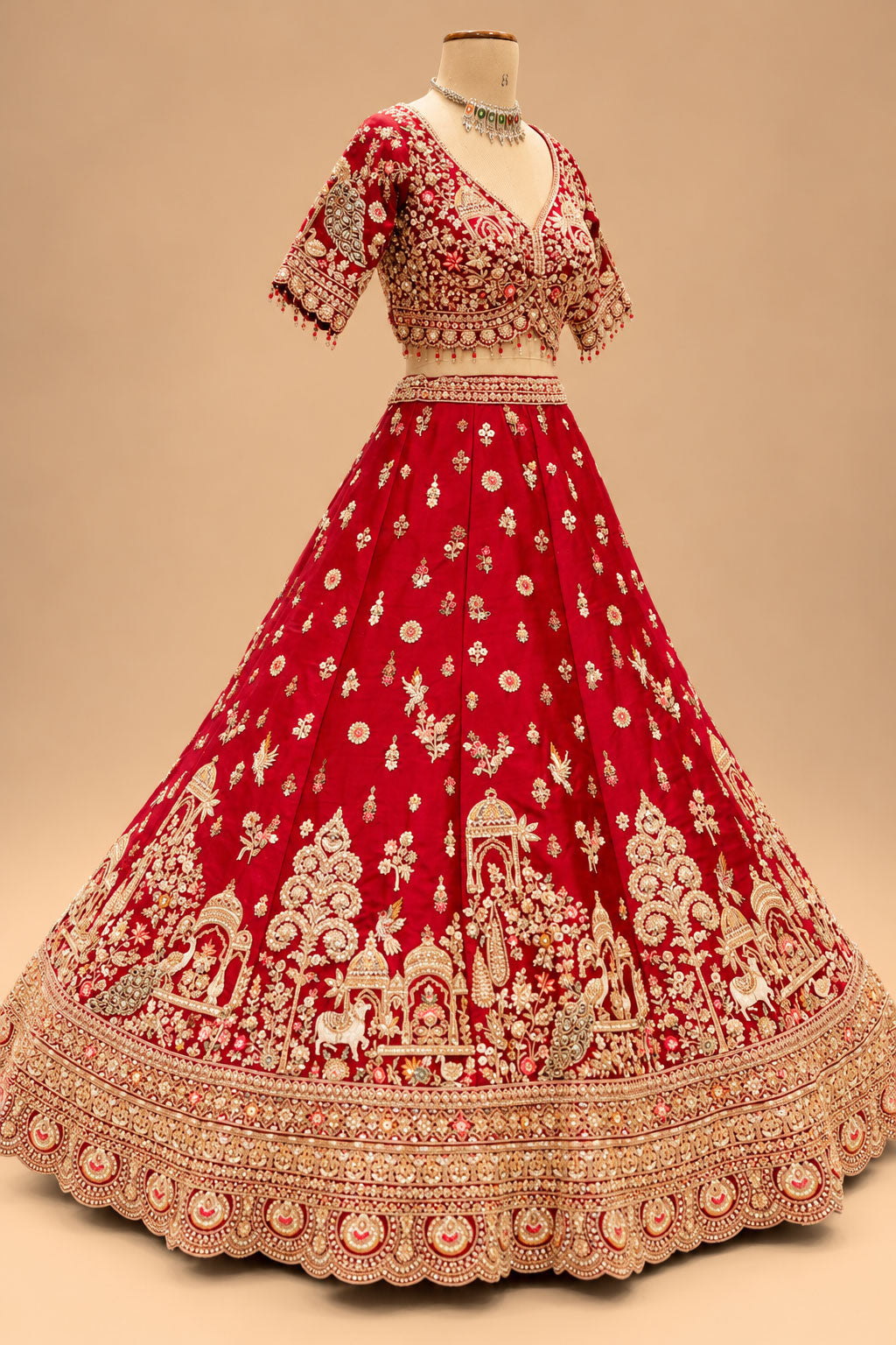 Luxury Red Bridal Lehenga with Intricate Gold Embroidery, Traditional Motifs and Designer Dupatta