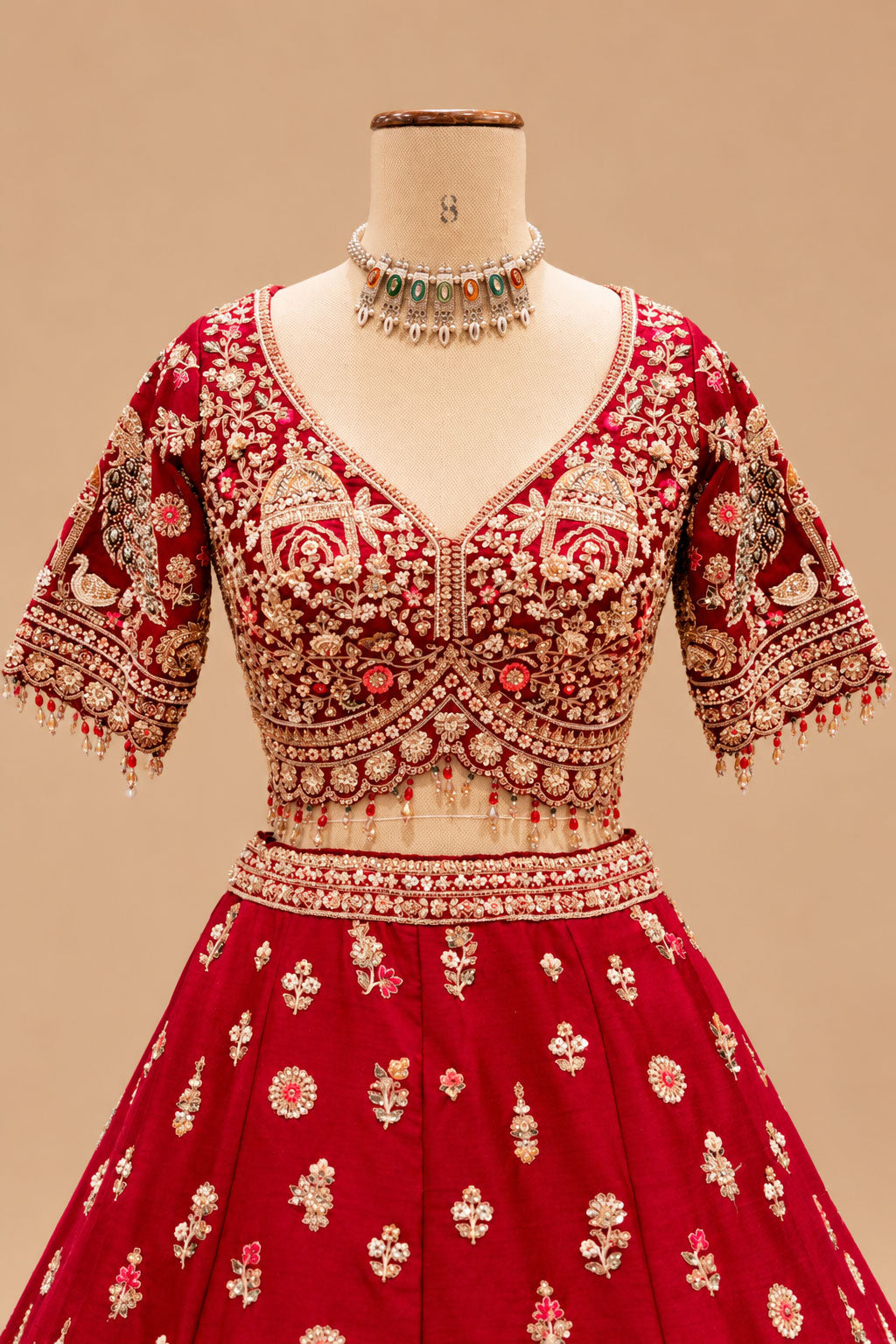 Luxury Red Bridal Lehenga with Intricate Gold Embroidery, Traditional Motifs and Designer Dupatta