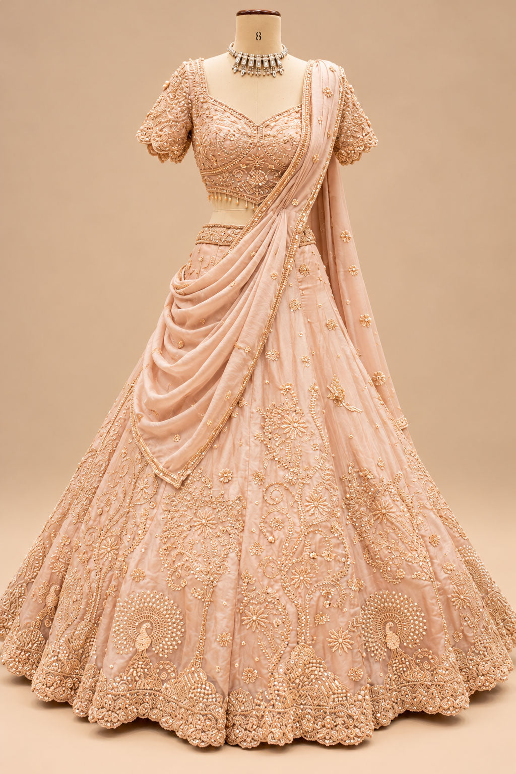 Premium Blush Peach Bridal Lehenga with Intricate Floral Embroidery, Peacock Motifs and Embellished Dupatta