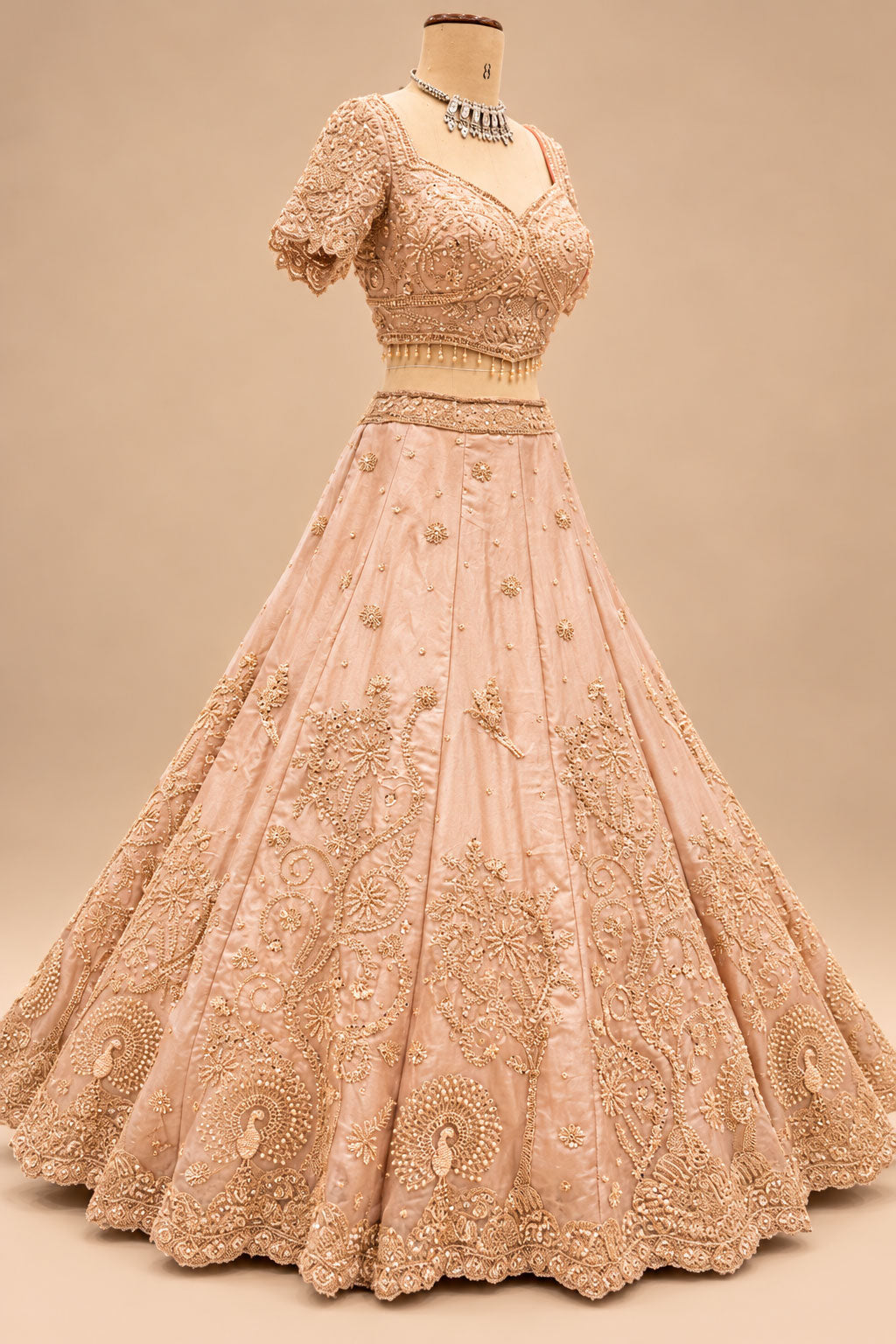Premium Blush Peach Bridal Lehenga with Intricate Floral Embroidery, Peacock Motifs and Embellished Dupatta