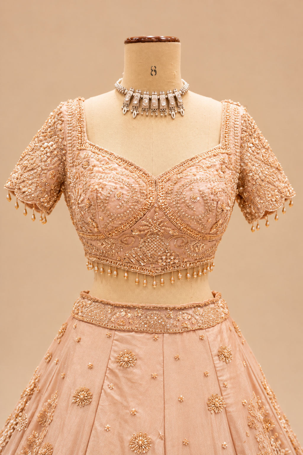 Premium Blush Peach Bridal Lehenga with Intricate Floral Embroidery, Peacock Motifs and Embellished Dupatta