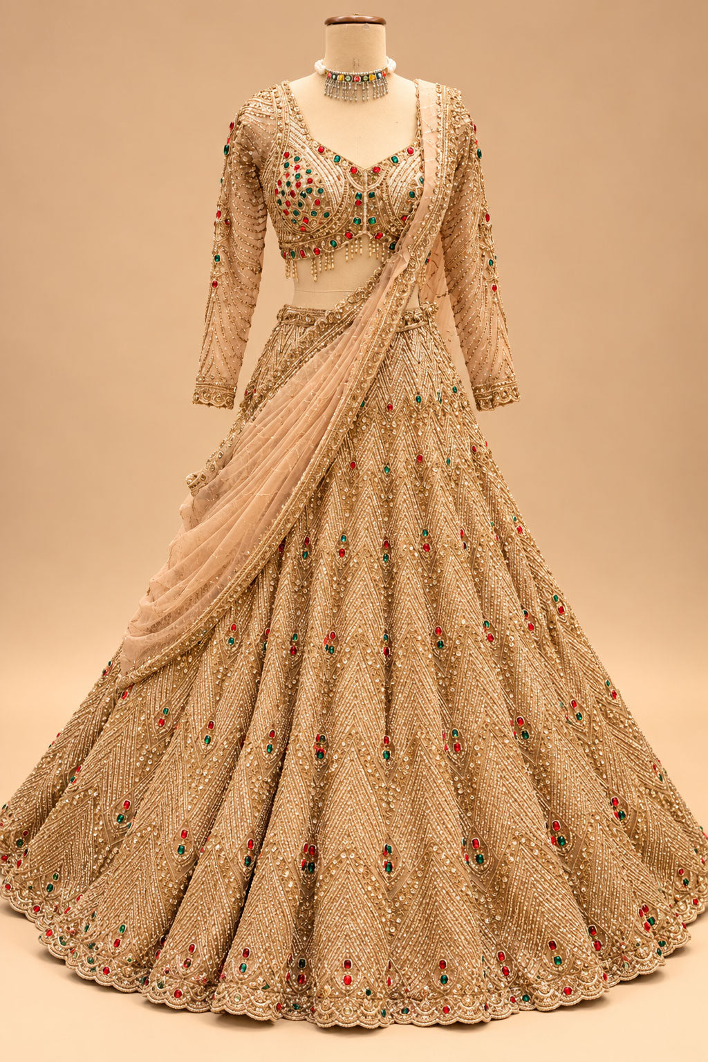 Luxury Champagne Gold Bridal Lehenga with Red & Emerald Green Embellishments, Heavy Embroidery and Designer Dupatta