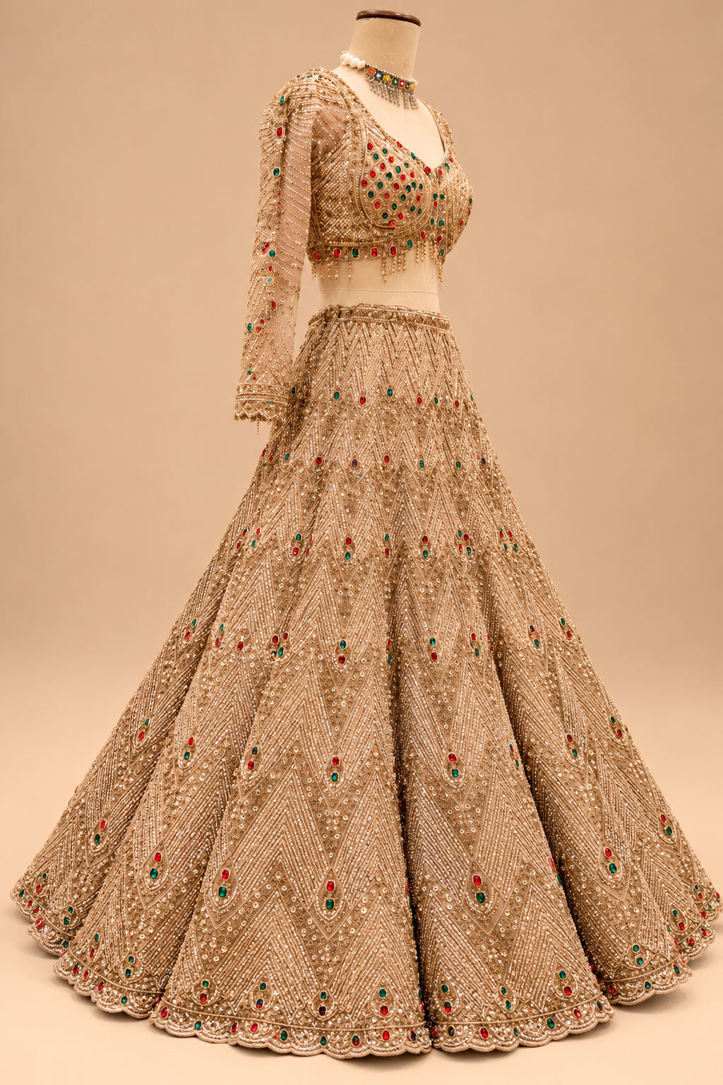 Luxury Champagne Gold Bridal Lehenga with Red & Emerald Green Embellishments, Heavy Embroidery and Designer Dupatta