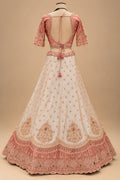 Premium Coral Peach and Ivory Bridal Lehenga with Intricate Embroidery and Dupatta – product view 5