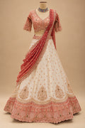 Premium Coral Peach and Ivory Bridal Lehenga with Intricate Embroidery and Dupatta – product view 6