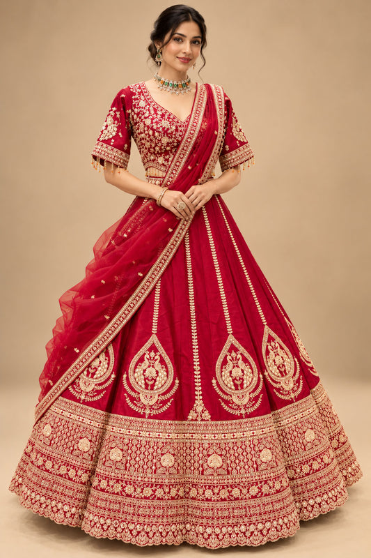 Luxury Maroon Bridal Lehenga with Gold Floral Embroidery and Heavy Embellished Border