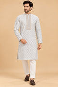 Premium Pastel Sky Blue Men's Kurta Pyjama Set with Intricate Geometric Pattern and Embroidered Neckline