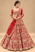 Luxury Red Bridal Lehenga with Heavy Gold Embroidery and Royal Architectural Motifs